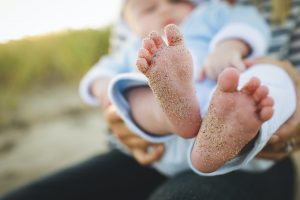 Top tips for a beach day with baby